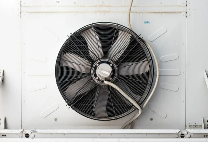 Industrial fan with a protective grille