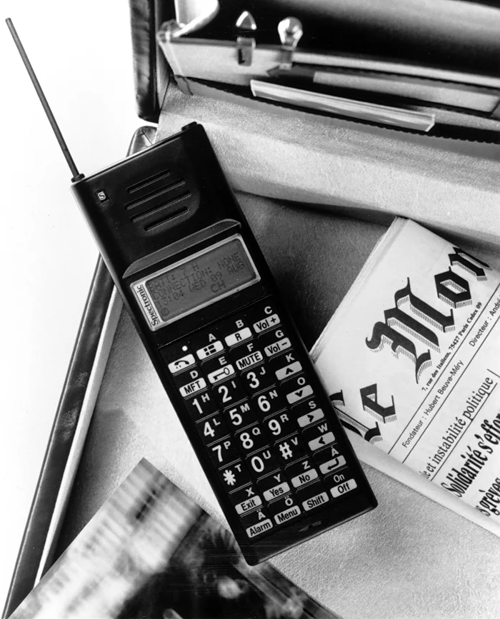 Spectronic TS260 data telephone beside a newspaper